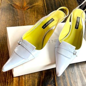 Well loved baby blue Albert Nipon Sling back heels